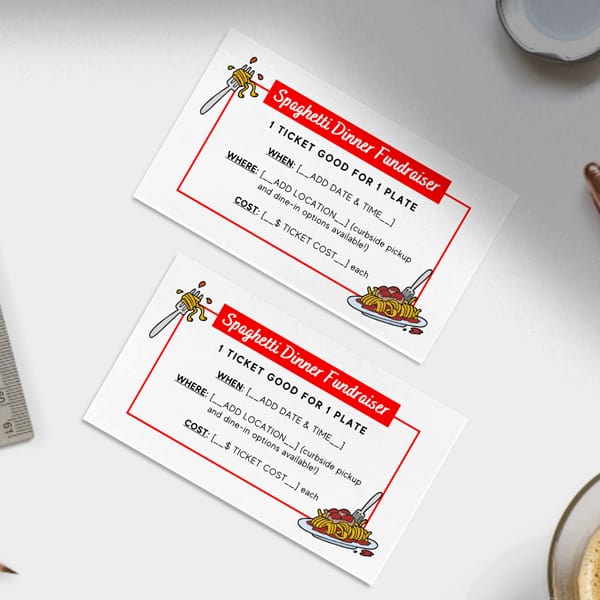 mockup of 2 spaghetti dinner fundraiser tickets on a white table